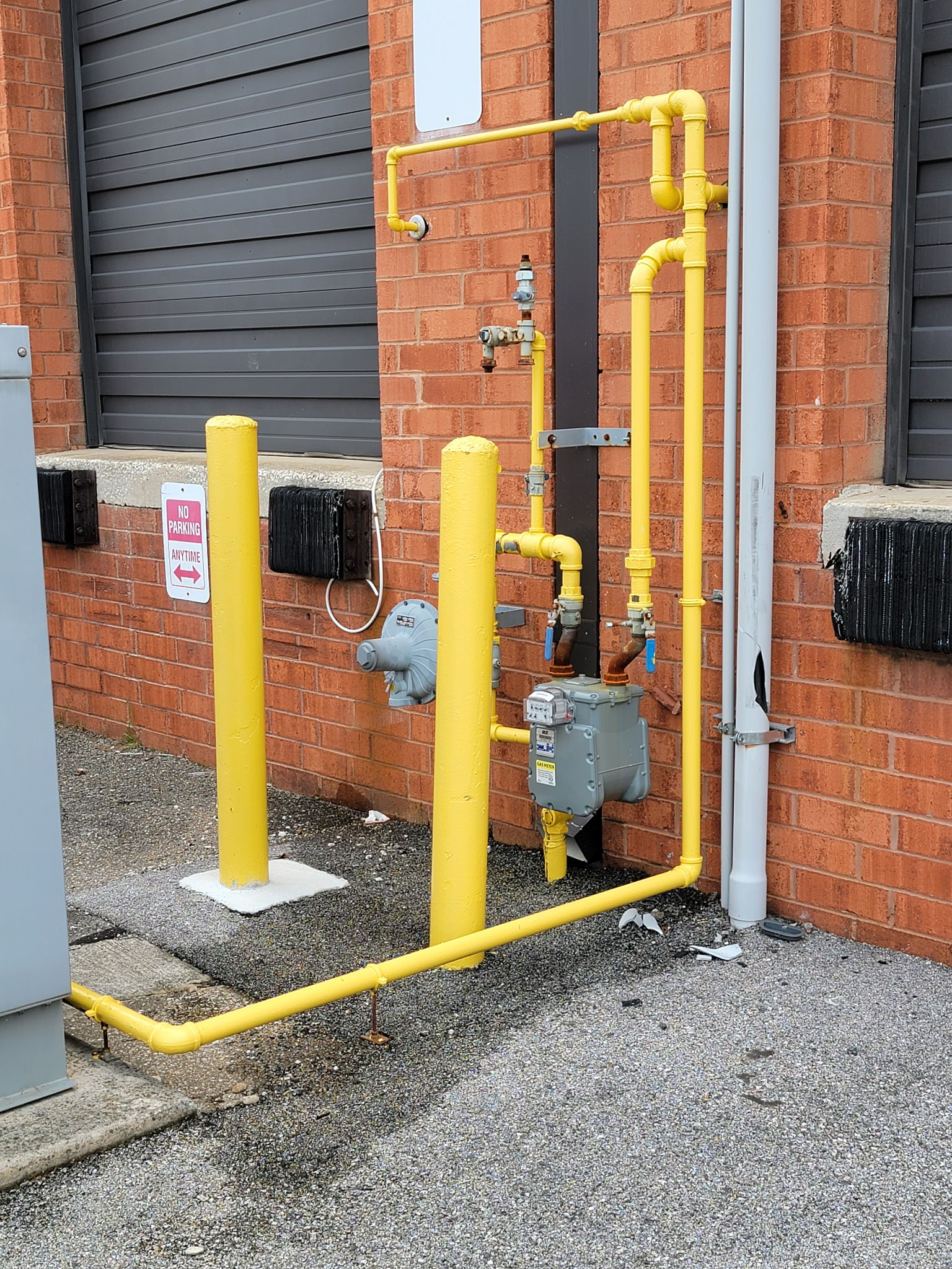 Fuel gas meter and yellow gas piping serving generator equipment